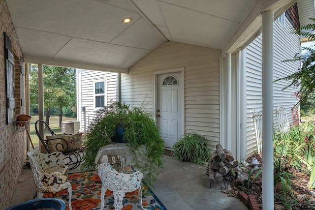 exterior space with vaulted ceiling