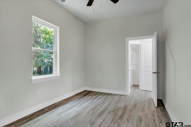 unfurnished room with light hardwood / wood-style floors and ceiling fan