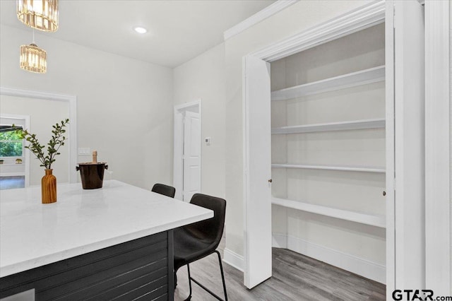 dining area with hardwood / wood-style floors