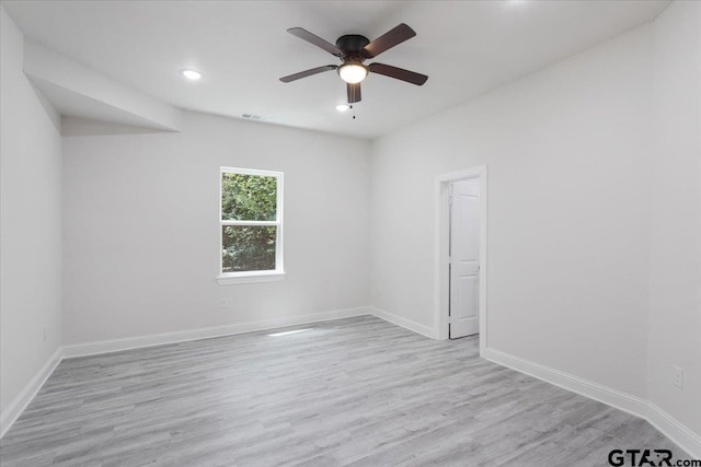 254 SE 19th St, Paris, TX 75460 - empty room featuring wood finished floors, baseboards, a ceiling fan, and recessed lighting