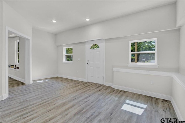 254 SE 19th St, Paris, TX 75460 - entrance foyer with wood finished floors, baseboards, and recessed lighting