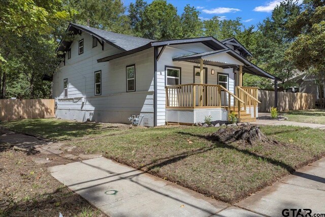 254 SE 19th St, Paris, TX 75460 - view of front of property with a porch, a shingled roof, and crawl space