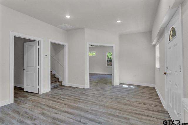 unfurnished room with light hardwood / wood-style flooring