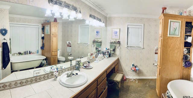 bathroom with vanity, toilet, a bathtub, and ornamental molding