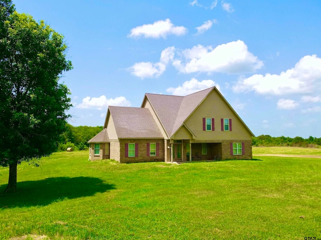 view of front of home with a front lawn