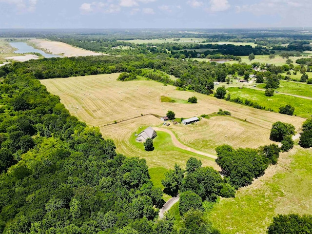 drone / aerial view featuring a rural view and a water view