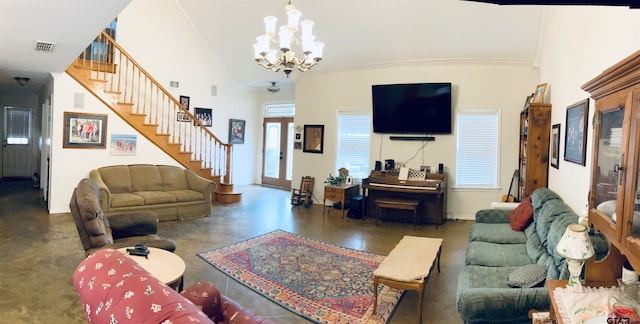 living room featuring high vaulted ceiling and a notable chandelier