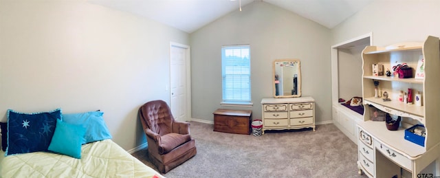 sitting room featuring light carpet and lofted ceiling