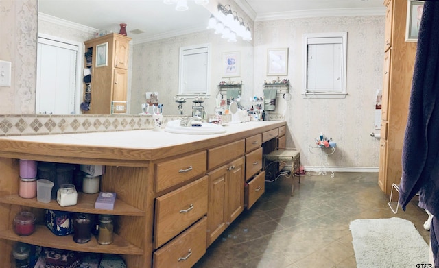 bathroom featuring tile patterned flooring, vanity, and ornamental molding