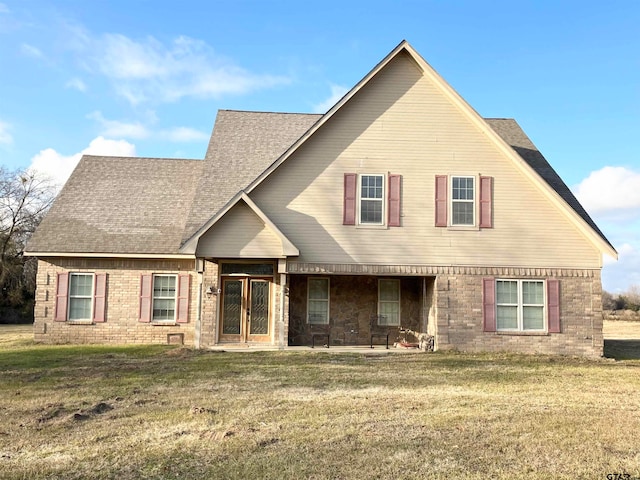 view of front of home with a front yard