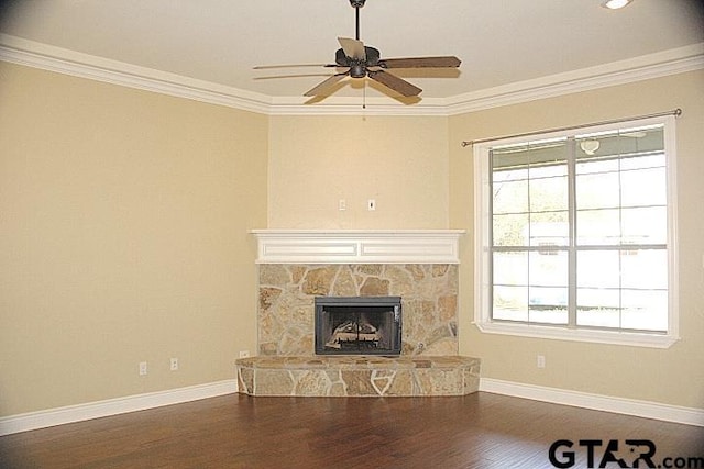 unfurnished living room featuring baseboards, dark wood-type flooring, a fireplace, and crown molding