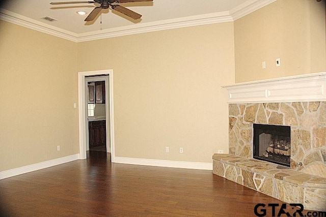 unfurnished living room featuring dark wood-style floors, visible vents, and crown molding