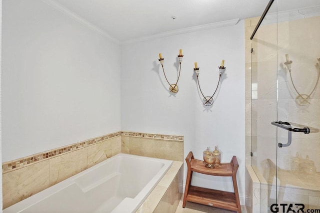 2801 Wexford Dr, Tyler, TX 75709 - bathroom featuring a garden tub, a shower stall, and ornamental molding