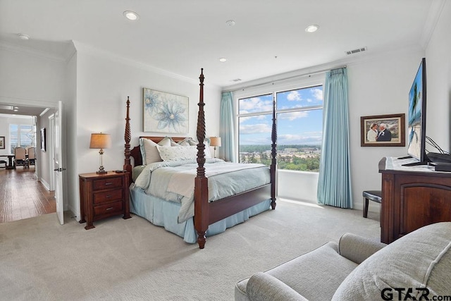 2801 Wexford Dr, Tyler, TX 75709 - bedroom with ornamental molding, light carpet, and recessed lighting