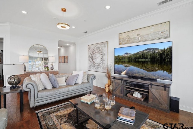 2801 Wexford Dr, Tyler, TX 75709 - living room with ornamental molding, wood finished floors, and recessed lighting