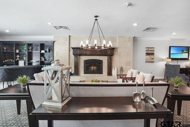 2801 Wexford Dr, Tyler, TX 75709 - living room with carpet floors, crown molding, recessed lighting, and a lit fireplace