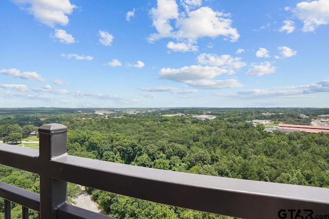2801 Wexford Dr, Tyler, TX 75709 - balcony featuring a wooded view
