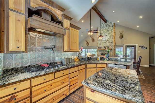 kitchen with tasteful backsplash, premium range hood, dark stone counters, beam ceiling, and stainless steel appliances