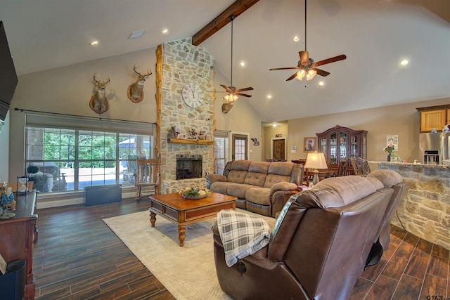 living room with a fireplace, beam ceiling, high vaulted ceiling, and ceiling fan