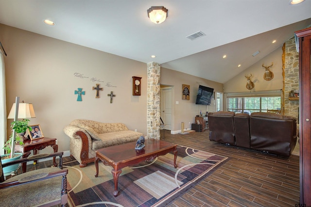 living room featuring vaulted ceiling