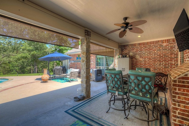 view of patio / terrace with ceiling fan