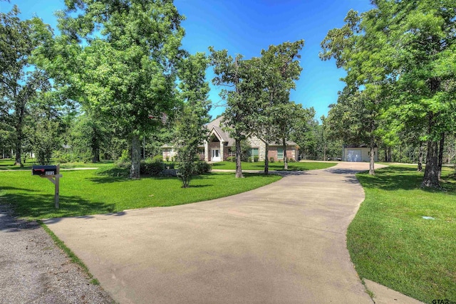 view of community featuring a lawn