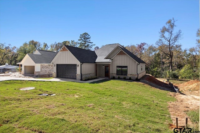 modern farmhouse featuring a garage and a front yard