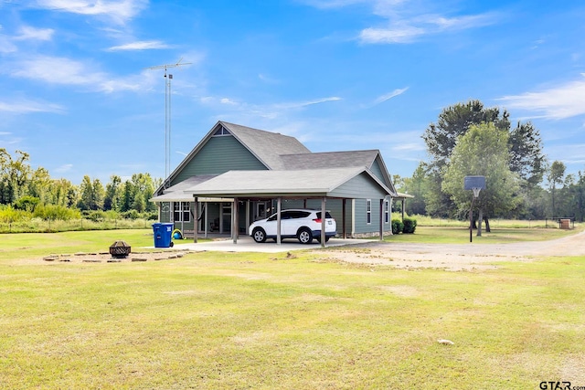 exterior space featuring a lawn and a carport