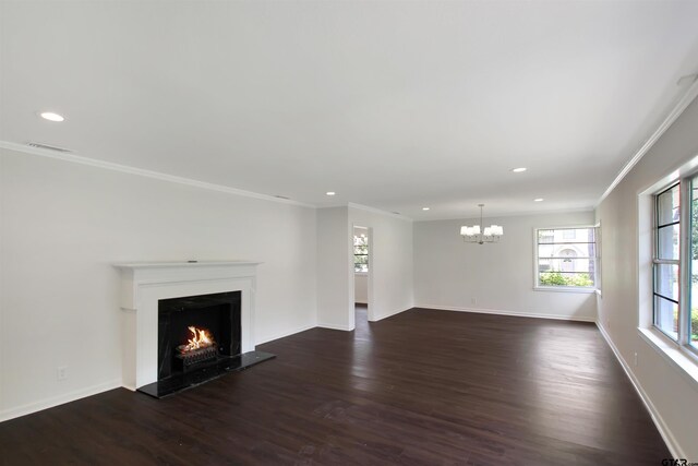 1301 Roseland Blvd, Tyler, TX 75701 - unfurnished living room with crown molding, recessed lighting, dark wood-type flooring, a chandelier, and a warm lit fireplace
