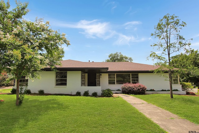 1301 Roseland Blvd, Tyler, TX 75701 - single story home with a front lawn and a shingled roof