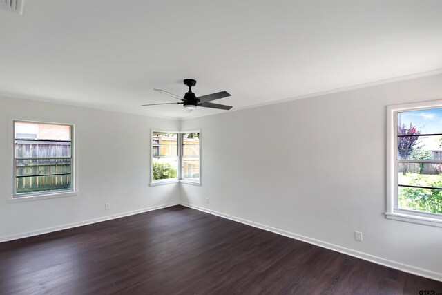 1301 Roseland Blvd, Tyler, TX 75701 - unfurnished room with dark wood-style flooring and a ceiling fan