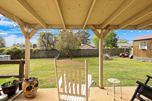 2207 Pinecrest Dr, Gladewater, TX 75647 - view of yard with a shed, a patio, a fenced backyard, and an outbuilding