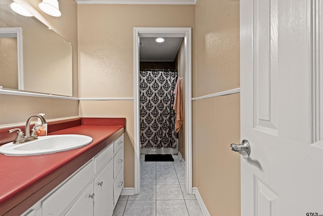 2207 Pinecrest Dr, Gladewater, TX 75647 - bathroom with a shower with shower curtain, tile patterned flooring, and vanity