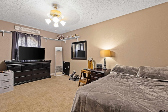 2207 Pinecrest Dr, Gladewater, TX 75647 - bedroom with a textured ceiling, baseboards, and carpet floors