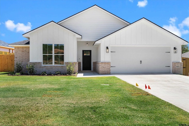 16513 Crossing Cir, Lindale, TX 75771 - modern farmhouse with board and batten siding, an attached garage, brick siding, and driveway