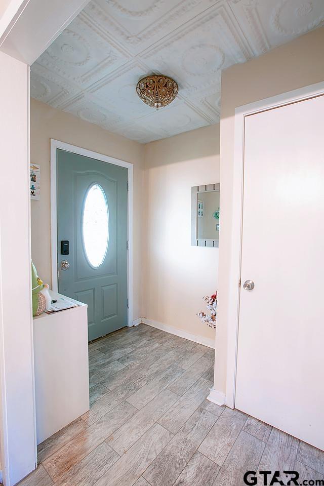 entrance foyer featuring light wood-type flooring