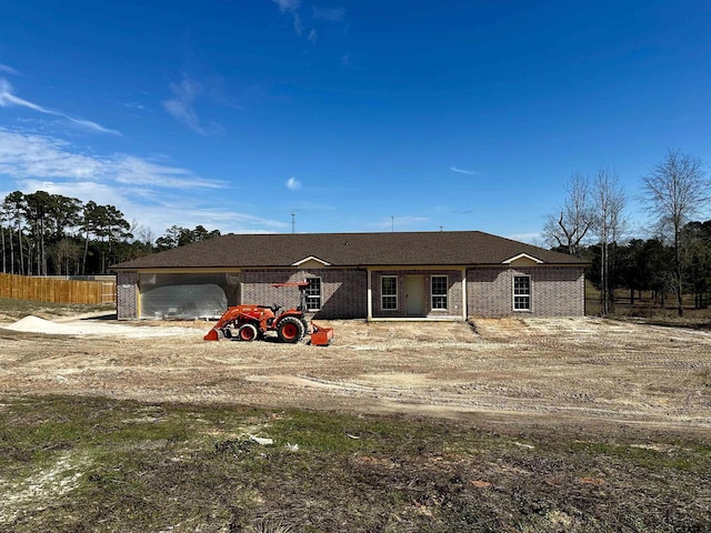 ranch-style house with brick siding