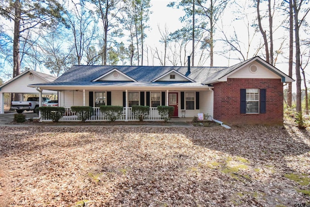 ranch-style home featuring covered porch