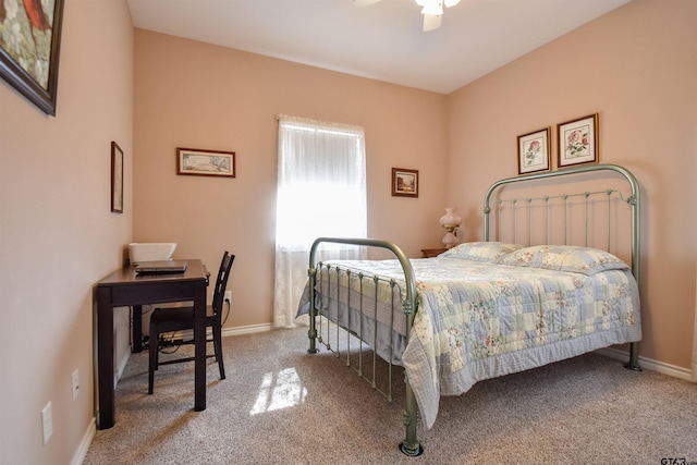 bedroom with light colored carpet and ceiling fan