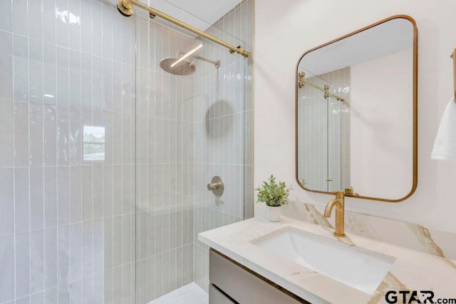 8100 Jewell Ln, Tyler, TX 75703 - bathroom with a tile shower and vanity