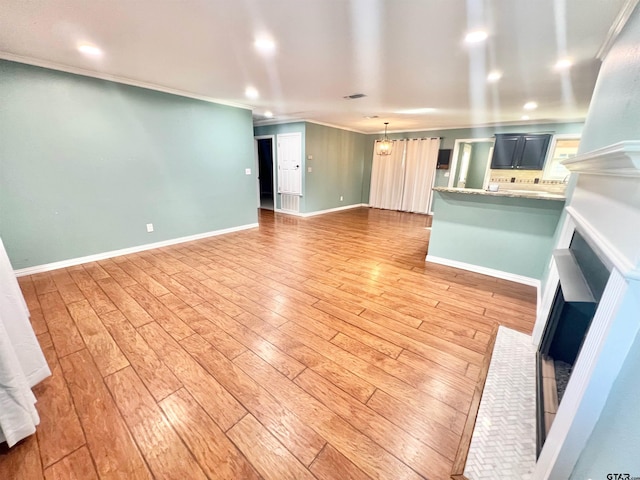 unfurnished living room with wood-type flooring