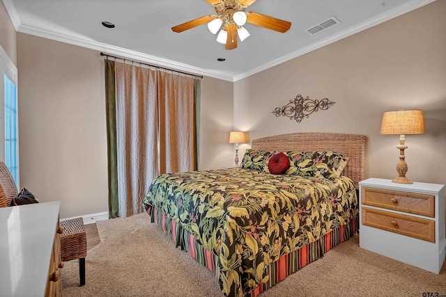 1014 Lovers Ln, Longview, TX 75604 - bedroom with ornamental molding, carpet floors, and a ceiling fan