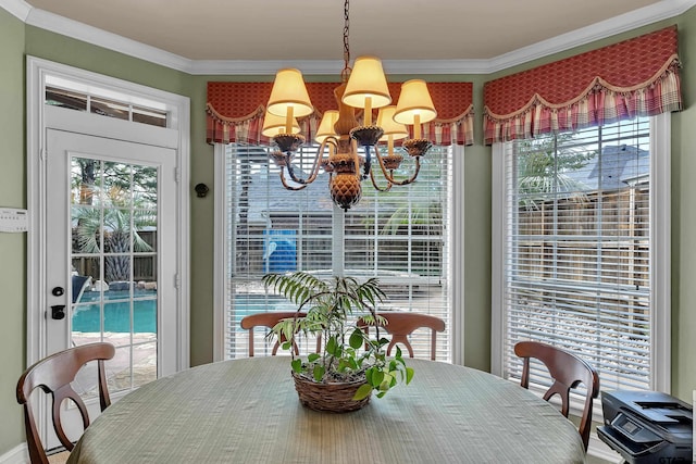 1014 Lovers Ln, Longview, TX 75604 - dining space featuring a chandelier and ornamental molding
