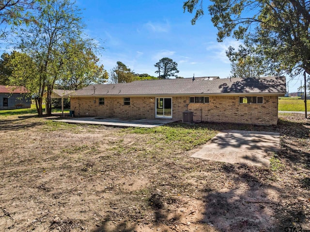 back of property with a patio area