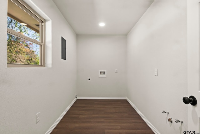 laundry area featuring washer hookup, hookup for an electric dryer, dark hardwood / wood-style flooring, electric panel, and gas dryer hookup