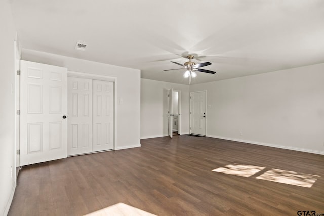 interior space featuring dark hardwood / wood-style floors and ceiling fan