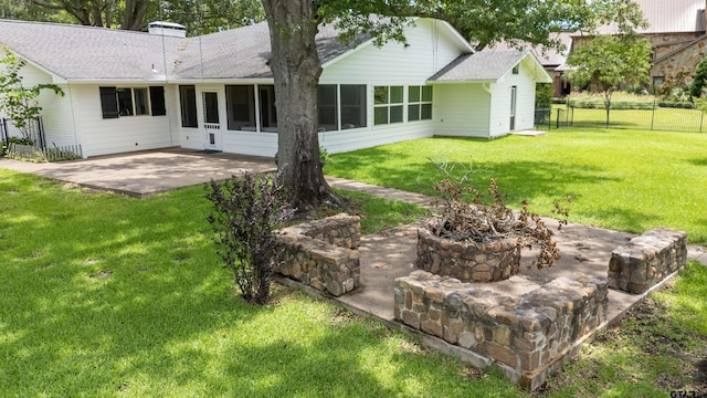 17893 Slack Rd, Whitehouse, TX 75791 - back of property with a patio area, roof with shingles, a sunroom, and a chimney