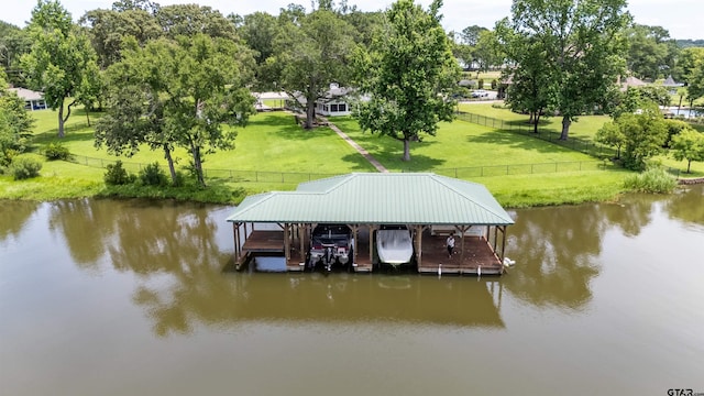 17893 Slack Rd, Whitehouse, TX 75791 - dock area with boat lift, a water view, and view of wooded area