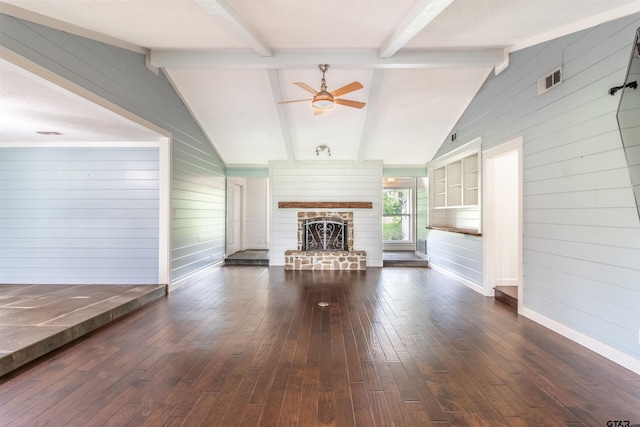 17893 Slack Rd, Whitehouse, TX 75791 - living room featuring wooden walls, hardwood / wood-style floors, a fireplace, and ceiling fan