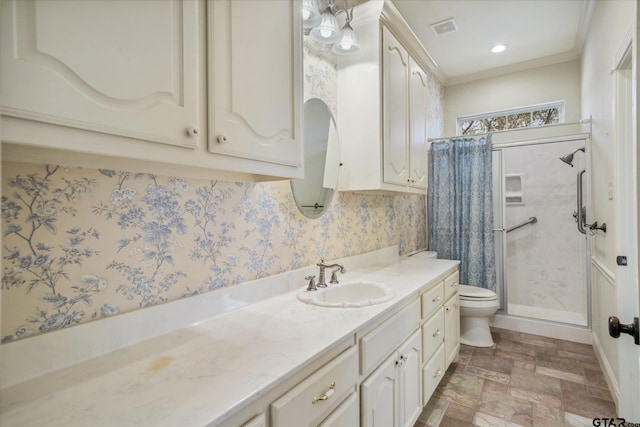 bathroom featuring toilet, visible vents, stone finish flooring, a shower stall, and vanity